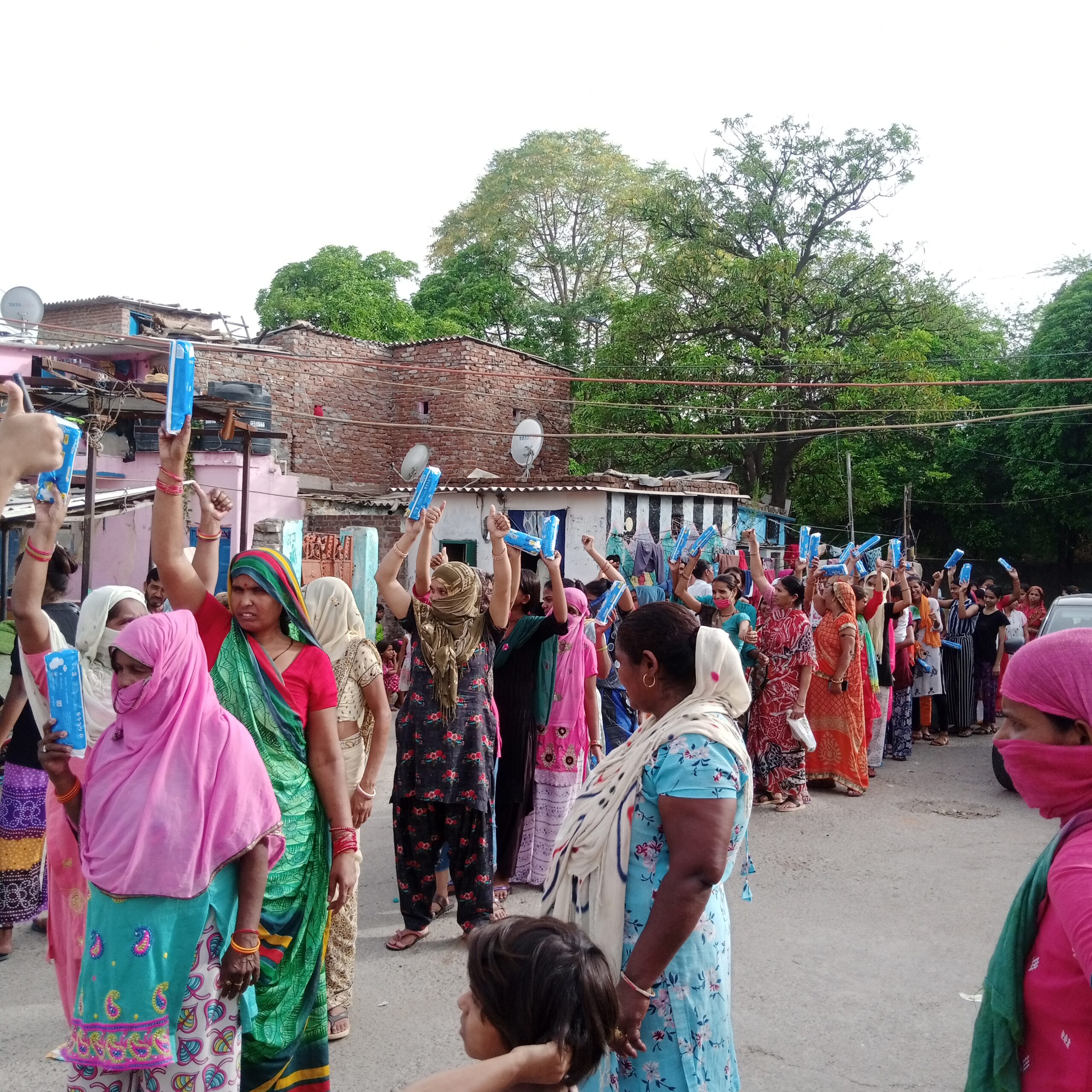 Women with menstrual hygiene products